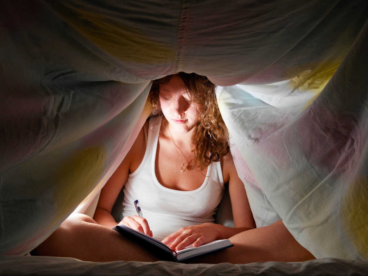 woman-writing-in-journal